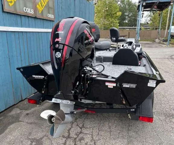 Slide: The Image of 2025 Tracker Pro Team 195 TXW Tournament Edition boat with powerful outboard motor. - 3