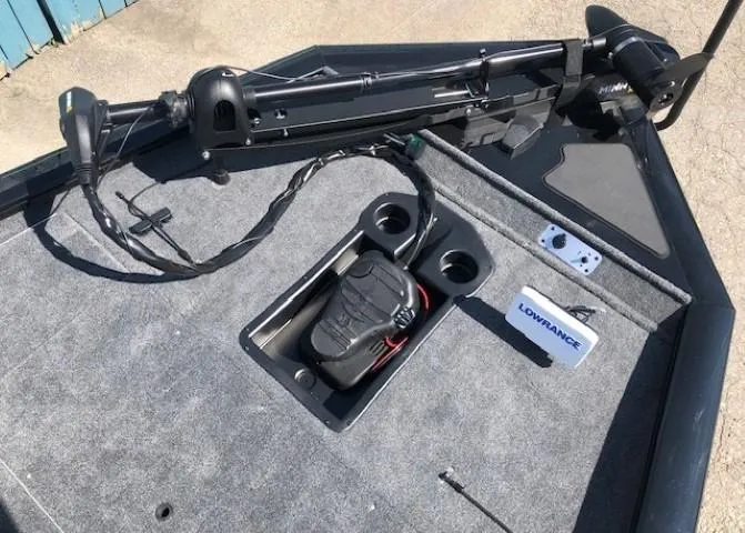 Slide: The Image of 2025 Tracker Pro Team 195 TXW Tournament Edition boat deck with trolling motor and Lowrance electronics. - 7