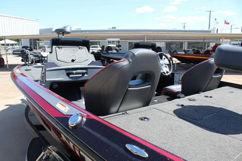 Slide: The Image of 2022 Nitro Z19 Pro boat interior with seating and control panel, displayed outdoors. - 10