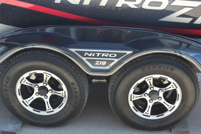 Slide: The Image of Trailer wheels of a 2022 Nitro Z19 Pro boat, featuring stylish rims and branding. - 15