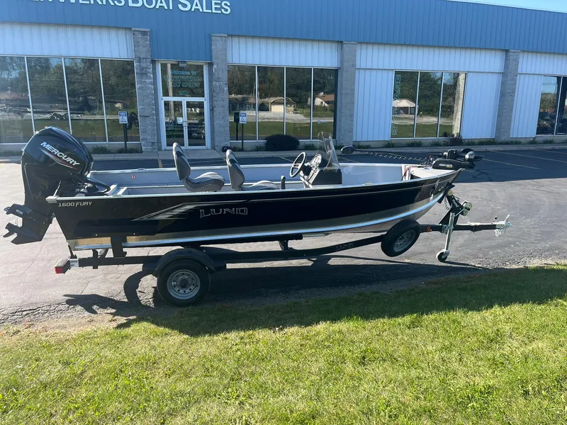 The Image of 2025 Lund 1600 Fury SS boat on trailer outside dealership. - 0