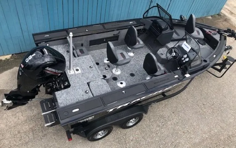 Slide: The Image of 2025 Tracker Targa V18 Combo fishing boat with Mercury outboard engine, aerial view. - 4