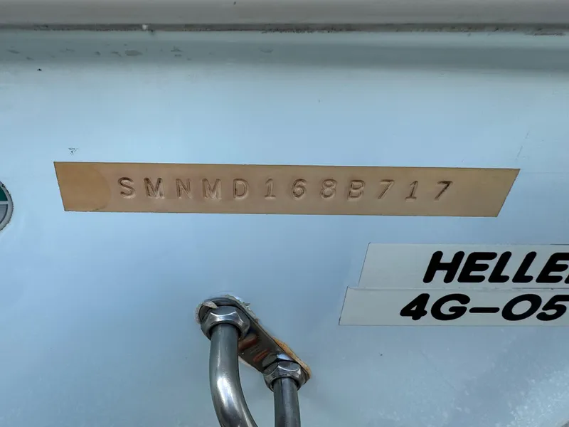 Slide: The Image of 2017 Sportsman Masters 267 Bay Boat hull identification number and registration details. - 5