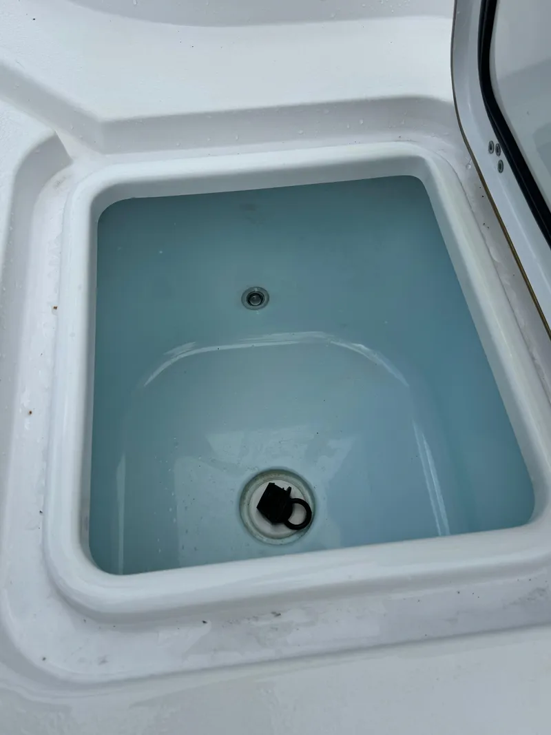 Slide: The Image of Livewell compartment on a 2017 Sportsman Masters 267 Bay Boat. - 9