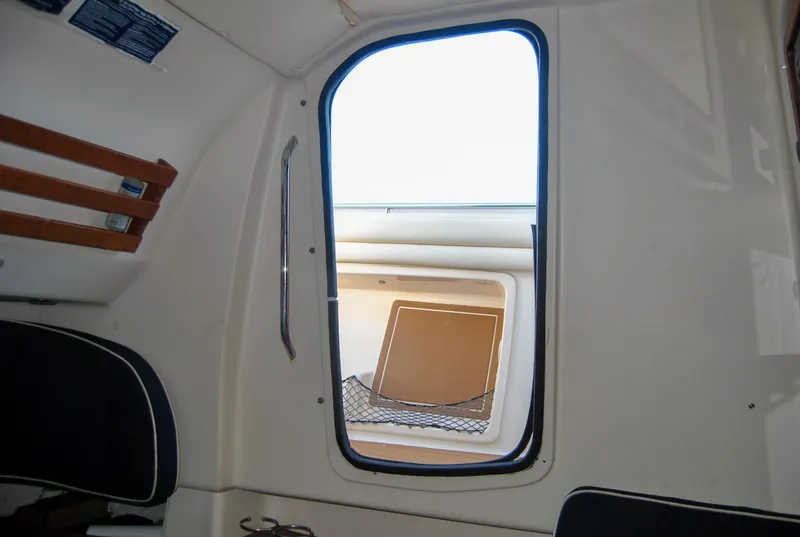 Slide: The Image of Interior view of 2018 Grady-White Canyon 376 boat cabin with open hatch. - 18