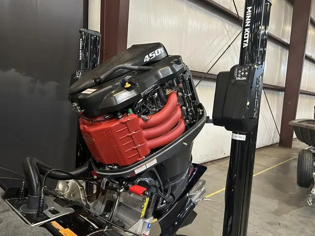 Slide: The Image of 2023 Skeeter FXR21 with Yamaha 250 SHO engine in a garage setting. - 15