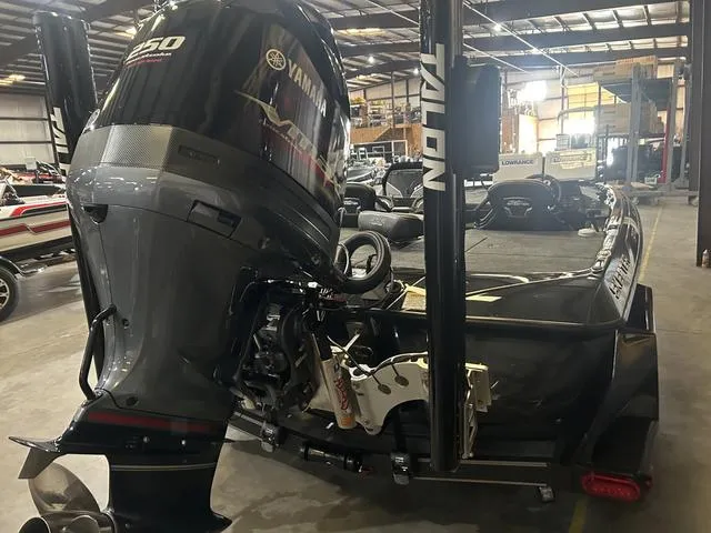 Slide: The Image of 2023 Skeeter FXR21 boat with Yamaha 250 SHO engine in a warehouse. - 4