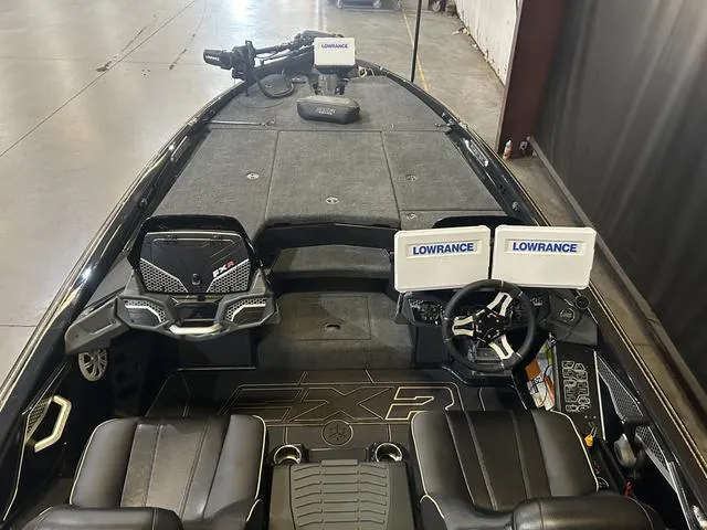 Slide: The Image of 2023 Skeeter FXR21 boat interior with dual Lowrance displays and Yamaha 250 "SHO" engine. - 9