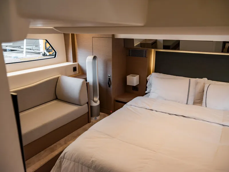 Slide: The Image of Luxurious bedroom interior of 2022 Prestige 460F yacht with modern furnishings. - 11