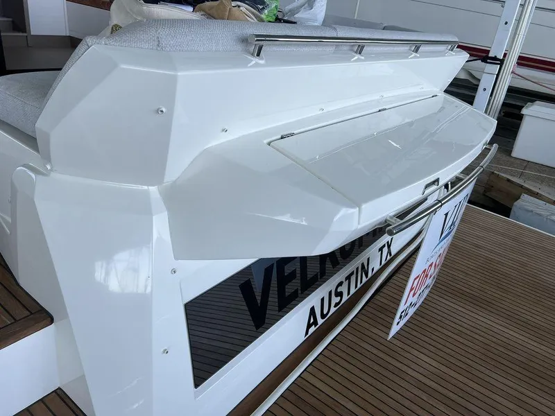 Slide: The Image of 2022 Prestige 460F yacht stern with Austin, TX signage. - 20