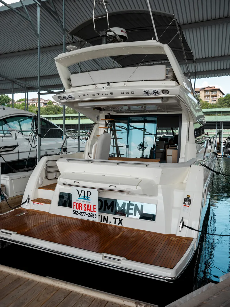 Slide: The Image of Prestige 460F 2022 yacht for sale, docked in marina, Austin, TX. - 3