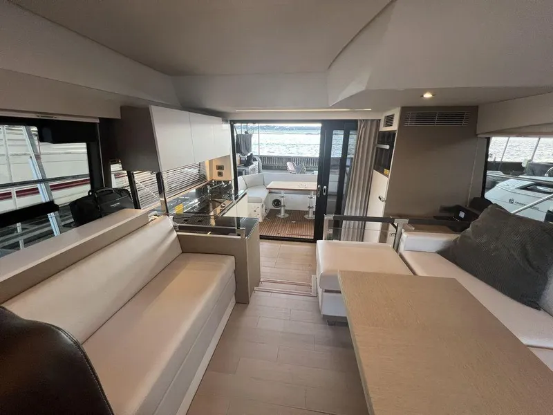 Slide: The Image of Luxurious interior of 2022 Prestige 460F yacht with modern seating and elegant design. - 49