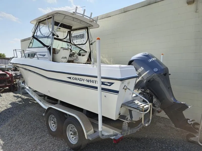 Slide: The Image of 1990 Grady-White 230 Gulfstream boat on trailer with Yamaha 300 engine. - 3