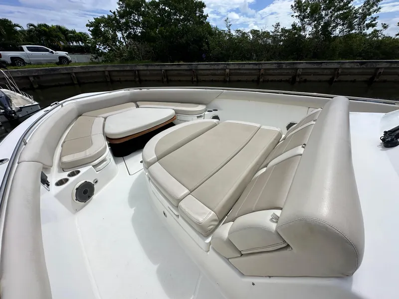 Slide: The Image of 2020 Boston Whaler 420 Outrage boat with spacious seating and sleek design. - 21