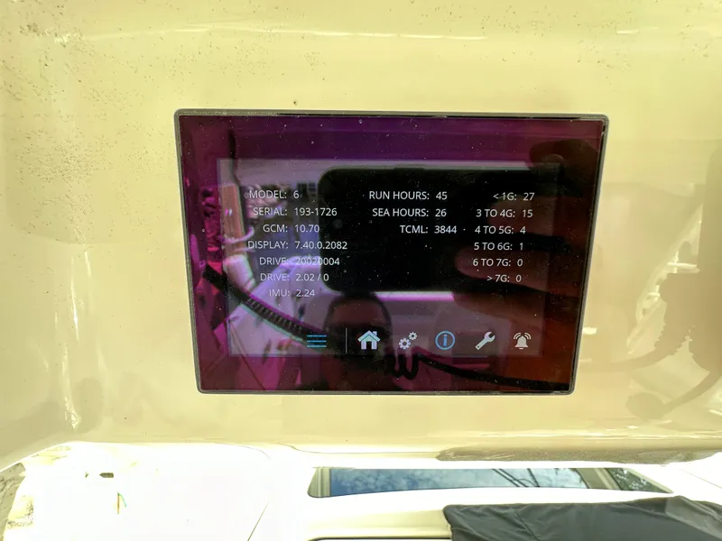 Slide: The Image of Display screen on 2020 Boston Whaler 420 Outrage showing engine and sea hours. - 26