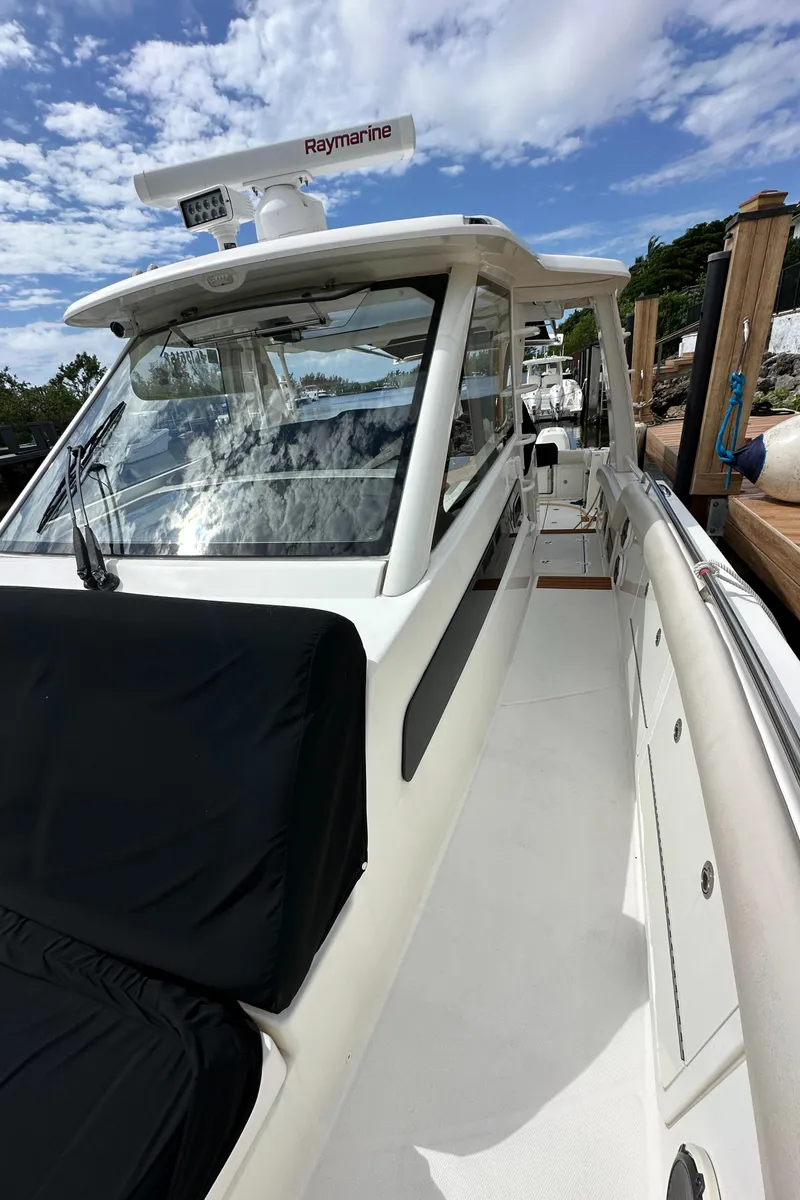 Slide: The Image of 2020 Boston Whaler 420 Outrage boat with sleek design and advanced navigation system. - 37
