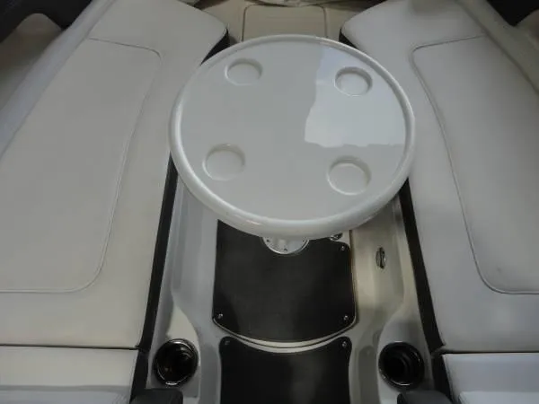Slide: The Image of Interior seating and table of 2011 Sea Ray 280 Sundeck boat. - 16