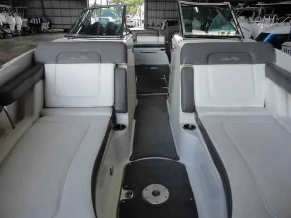 Slide: The Image of 2011 Sea Ray 280 Sundeck interior with spacious seating and sleek design. - 17