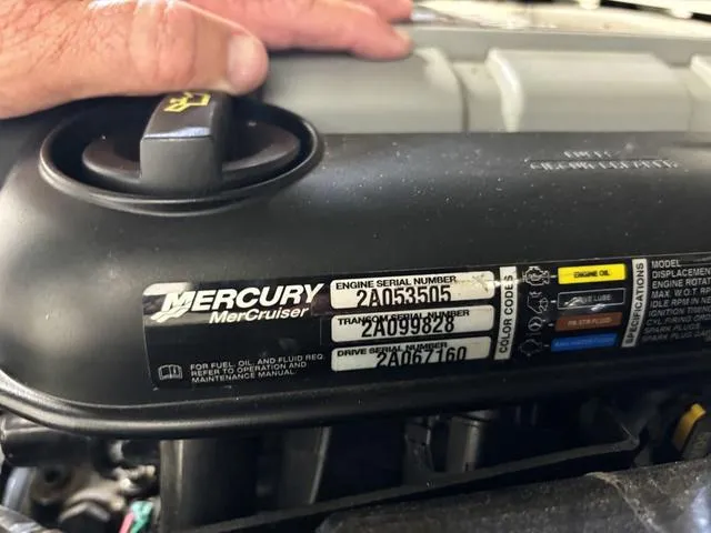 Slide: The Image of Close-up of a 2013 Tahoe Q5i SF Mercury MerCruiser engine serial number label. - 12