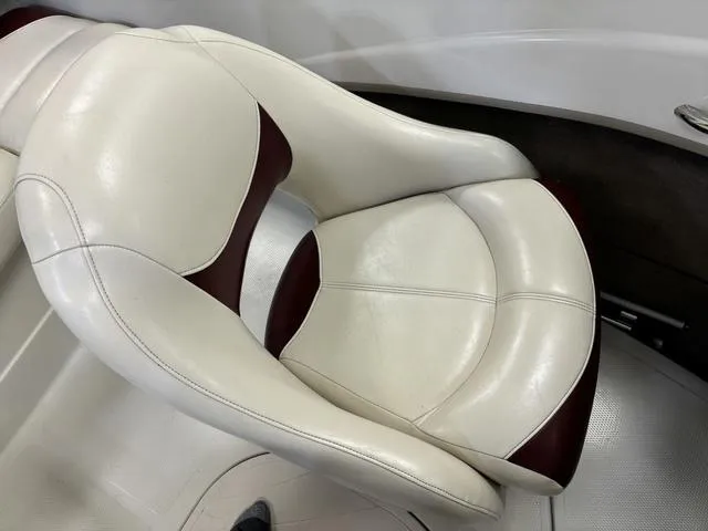 Slide: The Image of 2013 Tahoe Q5i SF boat seat, white and maroon leather upholstery. - 9