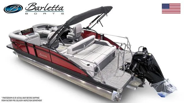 Slide: The Image of 2025 Barletta Cabrio C22UC pontoon boat with red exterior and modern seating. - 2