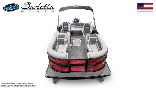 Slide: The Image of 2025 Barletta Cabrio C22UC pontoon boat, spacious seating, sleek design, American flag. - 6