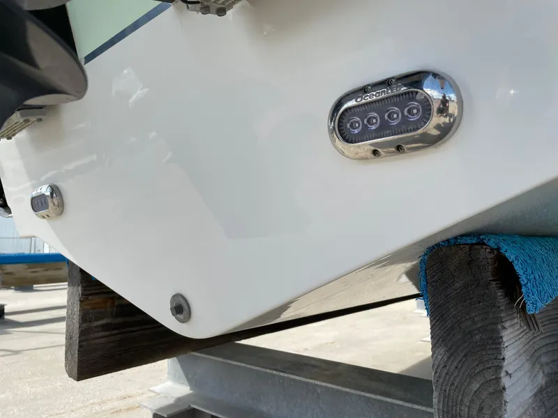 Slide: The Image of 2022 Sea Hunt Gamefish 25 boat with underwater LED lights on the hull. - 15