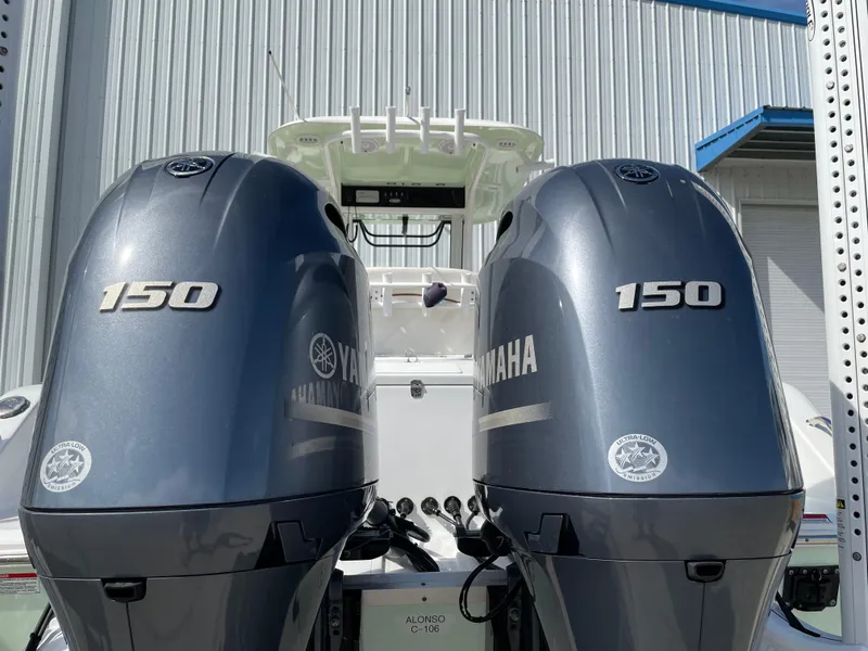 Slide: The Image of 2022 Sea Hunt Gamefish 25 with twin Yamaha 150 outboard engines. - 20