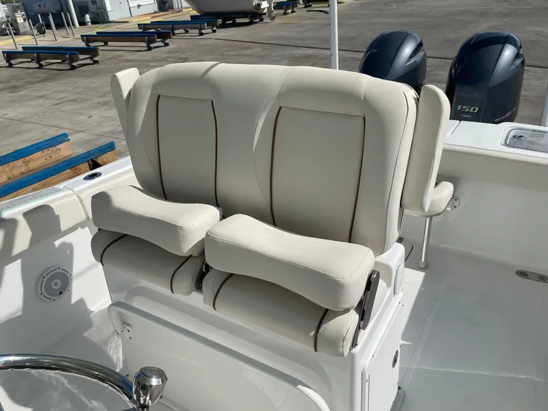Slide: The Image of 2022 Sea Hunt Gamefish 25 boat seating with dual outboard motors. - 35