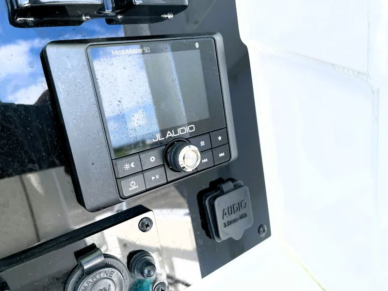 Slide: The Image of JL Audio system on 2022 Sea Hunt Gamefish 25 boat dashboard. - 39