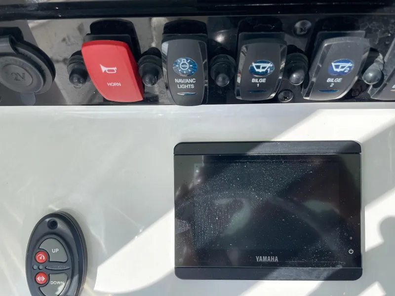 Slide: The Image of Control panel of 2022 Sea Hunt Gamefish 25 with switches and Yamaha display. - 41