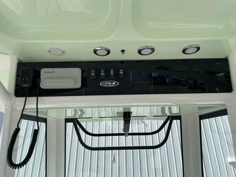 Slide: The Image of 2022 Sea Hunt Gamefish 25 boat dashboard with Garmin electronics and control panel. - 43