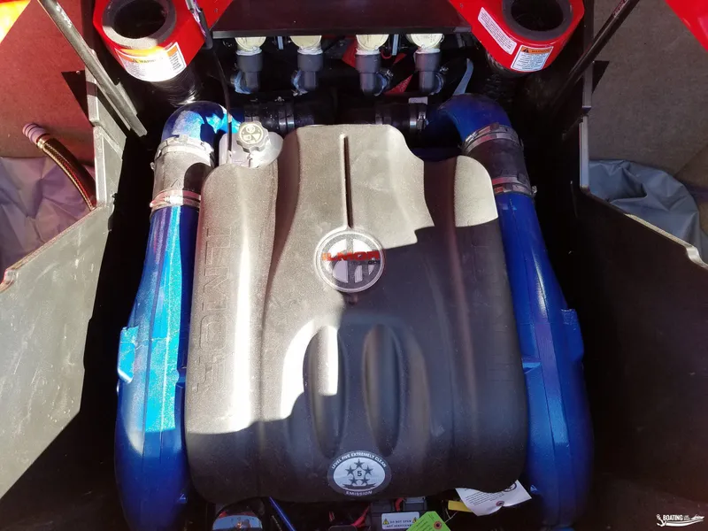 Slide: The Image of 2021 MasterCraft X26 engine compartment with Ilmor engine components. - 35