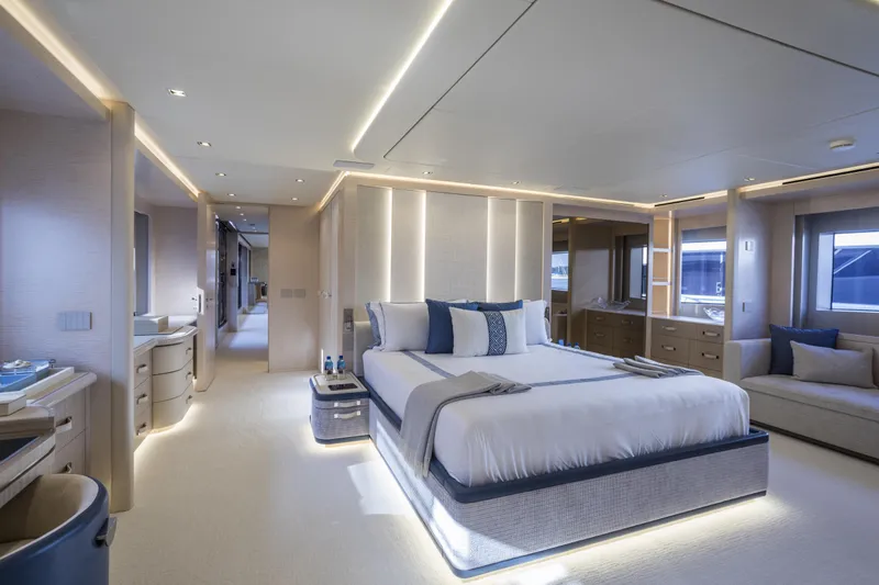 Slide: The Image of Luxurious bedroom interior of 2023 Mangusta Gransport yacht with modern design and ambient lighting. - 19