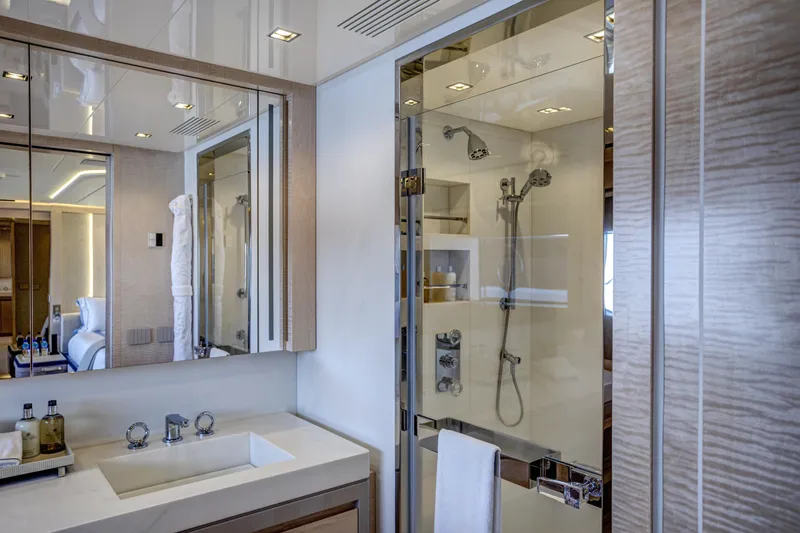 Slide: The Image of Luxurious bathroom in 2023 Mangusta Gransport yacht with modern fixtures and glass shower. - 28