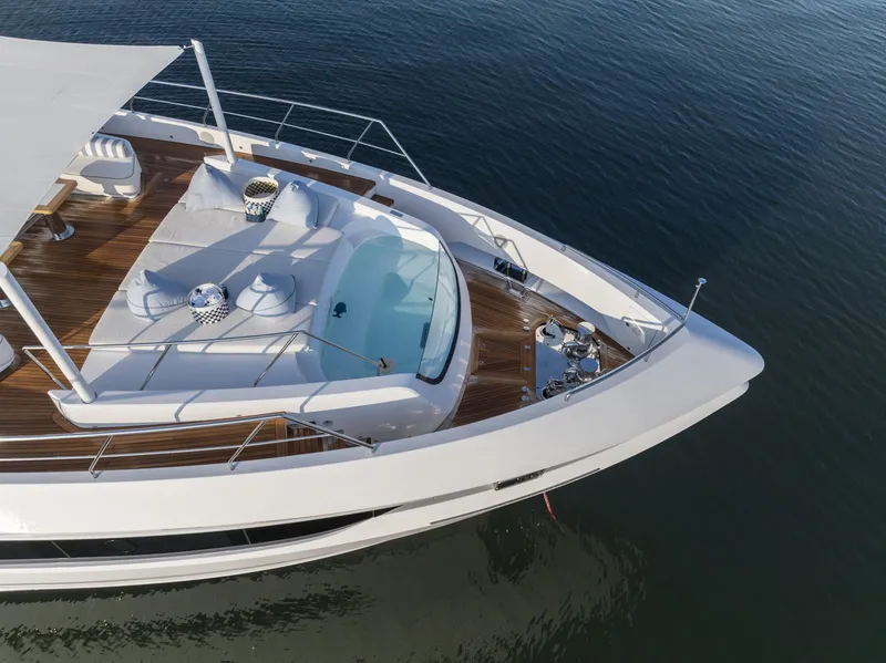 Slide: The Image of 2023 Mangusta Gransport yacht with luxurious deck and jacuzzi. - 6