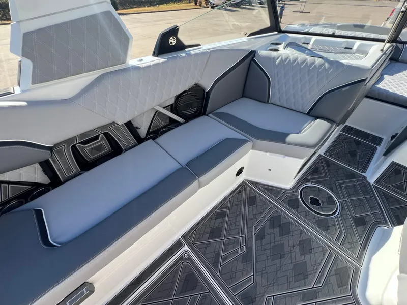 Slide: The Image of 2025 Tigé 24RZX boat interior with sleek seating and modern design. - 10