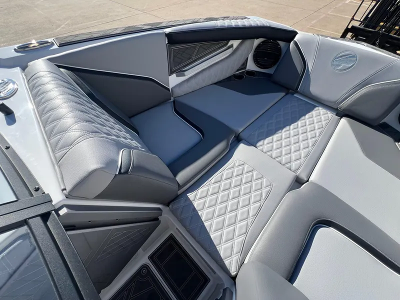 Slide: The Image of Luxurious interior of 2025 Tigé 24RZX boat with diamond-stitched seating. - 13
