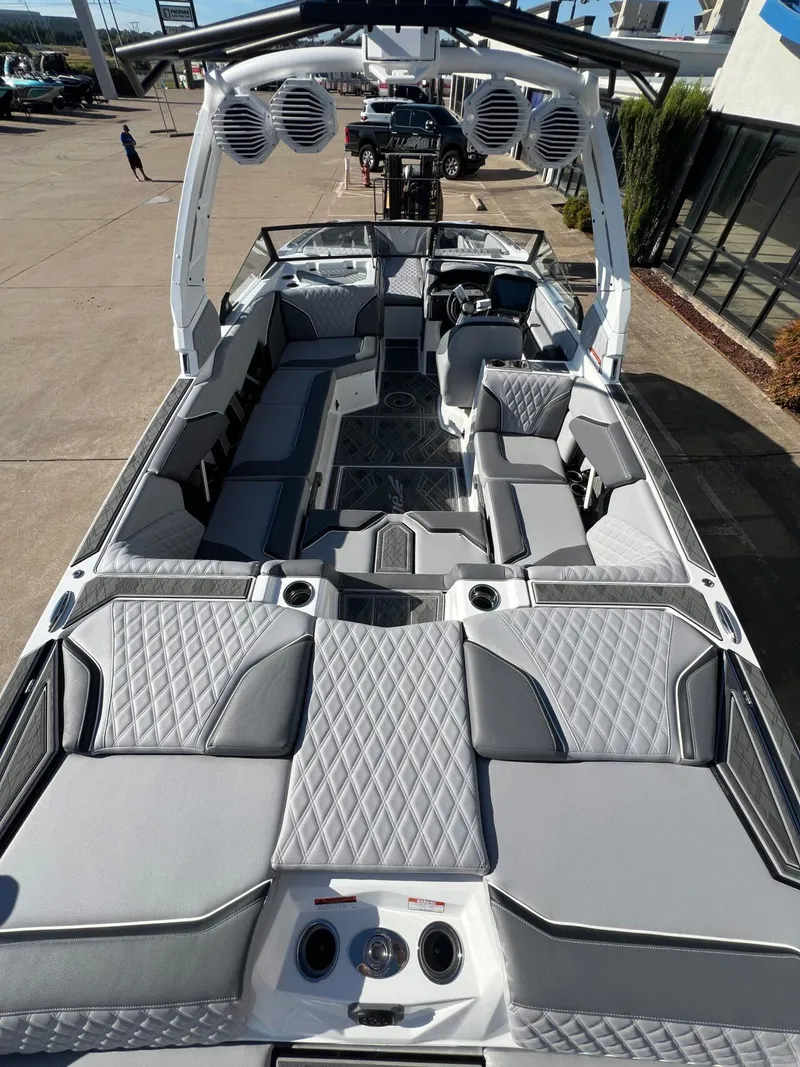Slide: The Image of 2025 Tigé 24RZX boat interior with spacious seating and modern design. - 6
