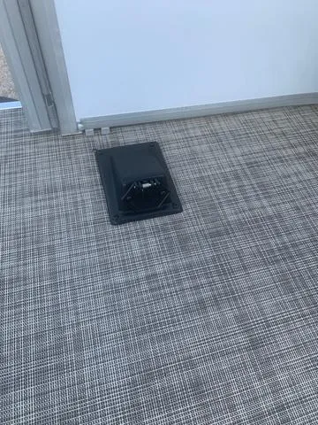 Slide: The Image of 2023 SunCatcher Select 18F interior with textured flooring and a mounted fixture. - 11