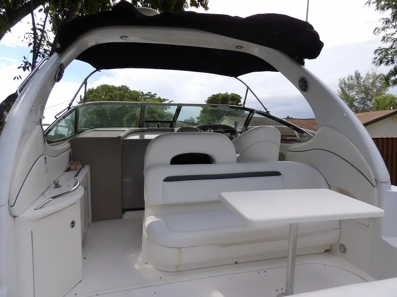 Slide: The Image of 2005 Sea Ray 360 Sundancer boat interior with seating and table. - 37