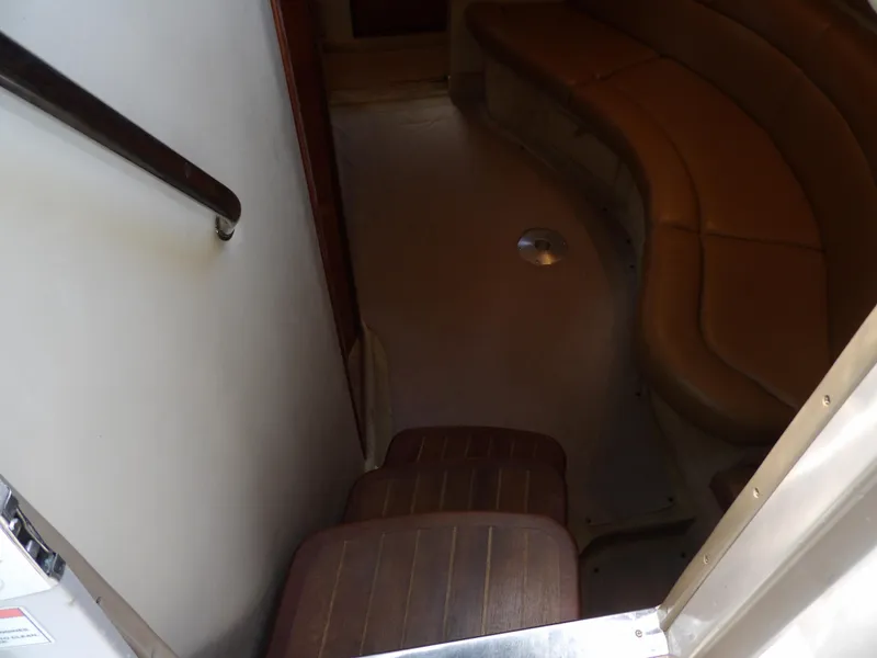 Slide: The Image of Interior view of 2005 Sea Ray 360 Sundancer cabin with curved seating. - 40