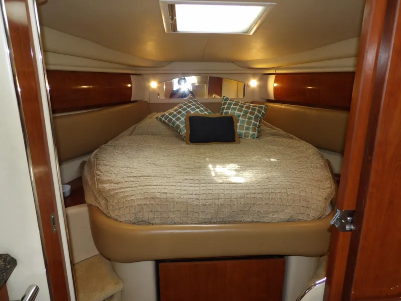 Slide: The Image of Luxurious cabin interior of 2005 Sea Ray 360 Sundancer yacht with cozy bedding. - 45