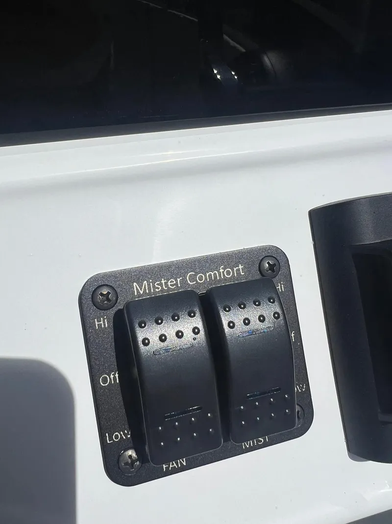 Slide: The Image of Control panel labeled "Mister Comfort" on 2025 JC 26 SportToon TT DSL boat. - 21