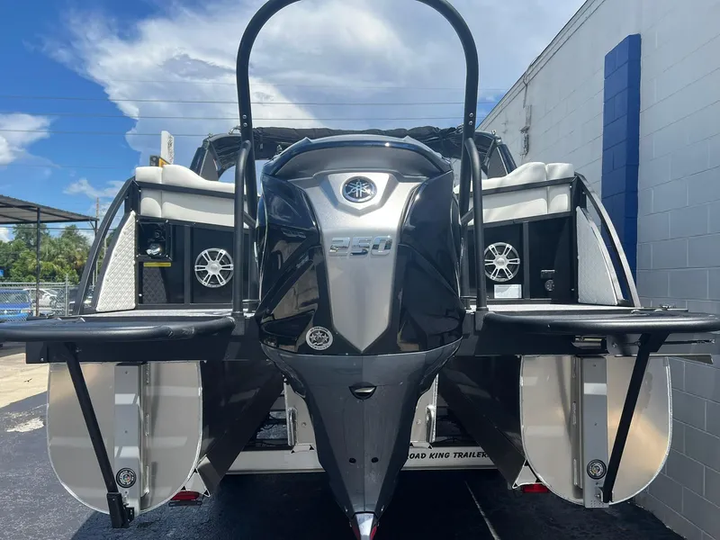 Slide: The Image of 2025 JC 26 SportToon TT DSL boat, rear view, showcasing sleek design and powerful features. - 4