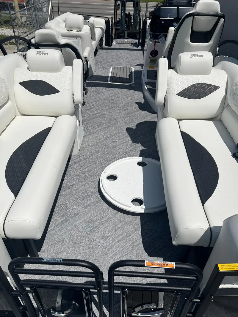 Slide: The Image of 2025 JC 26 SportToon TT DSL pontoon boat with luxurious seating and modern design. - 8