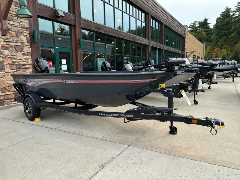 The Image of 2024 Ranger VS1665T boat displayed outside a store, ready for sale. - 0