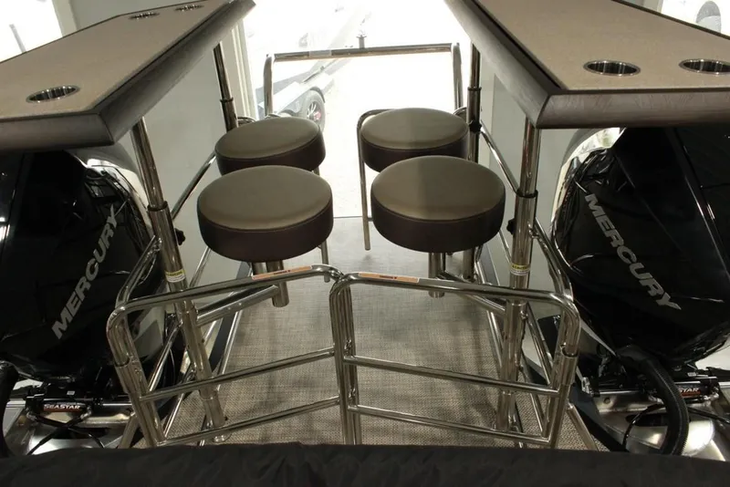 Slide: The Image of 2022 Vanderbilt 700SC boat interior with seating and Mercury engines. - 8