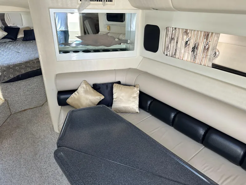 Slide: The Image of Interior of 2000 Wellcraft 45 Excalibur with modern seating and stylish decor. - 26