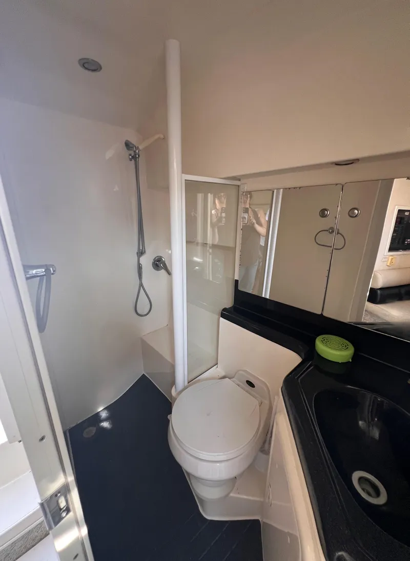 Slide: The Image of Bathroom interior of 2000 Wellcraft 45 Excalibur yacht with shower and toilet. - 37